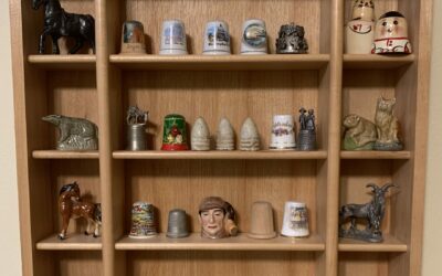 Civil War Bullets & My Mom’s Sewing Thimbles in the Curio Box from Hallmark upon the Wall